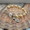 Pulsera rosario con perlas Swarovski y limón